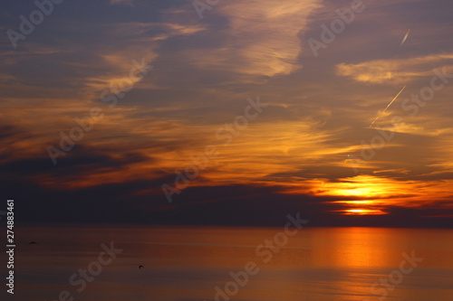 Sunset on the sea. Summer evening. © Natia