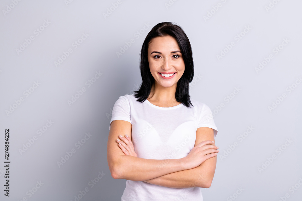 Portrait of her she nice-looking attractive lovely winsome shine glad cheerful optimistic girl folded arms isolated over light gray background Portrait of her she nice-looking attractive lovely winsome shine glad cheerful optimistic girl folded arms isolated over light gray background