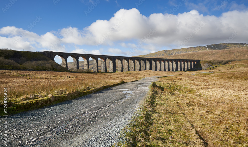 The Ribblehead Viaduct bridge crossing through the Yorkshire Dales, England.