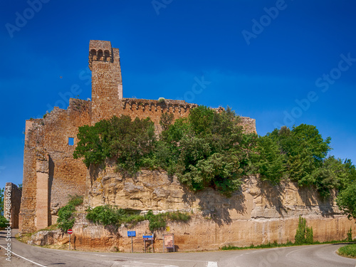 Rocca Aldobrandeschi - ancient fort, fortification ruins in Sovana, Tuscany, Italy. View from the street. photo
