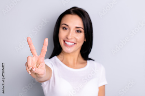 Wallpaper Mural Close-up portrait of her she nice attractive lovely shine lovable optimistic charming content cheerful cheery girl showing v-sign isolated over light gray pastel background Torontodigital.ca