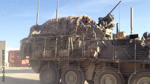 Army Stryker rolls in from a convoy with a mine roller attached to the front in Kandahar, Afghanistan. photo