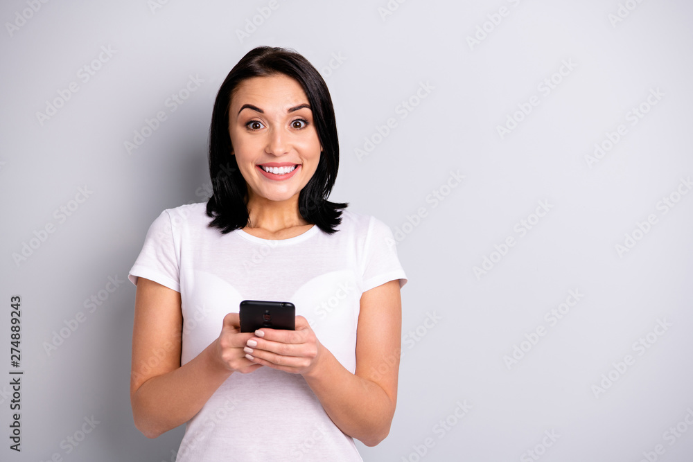 Portrait of her she nice-looking attractive lovely charming winsome shine cheerful cheery glad funny girl using 5g app free time smm blog blogger post isolated over light gray pastel background Portrait of her she nice-looking attractive lovely charming winsome shine cheerful cheery glad funny girl using 5g app free time smm blog blogger post isolated over light gray pastel background