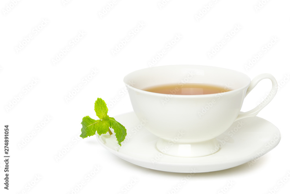 Tea in white cup with leaf mint isolated on white background. Tea in white cup with leaf mint isolated on white background.