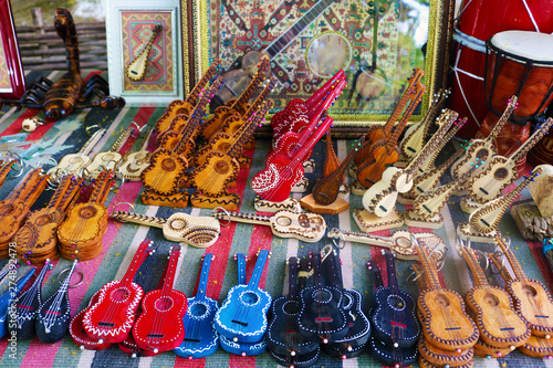 Wooden handmade souvenirs. string musical instruments at souvenir shop in Azerbaijan