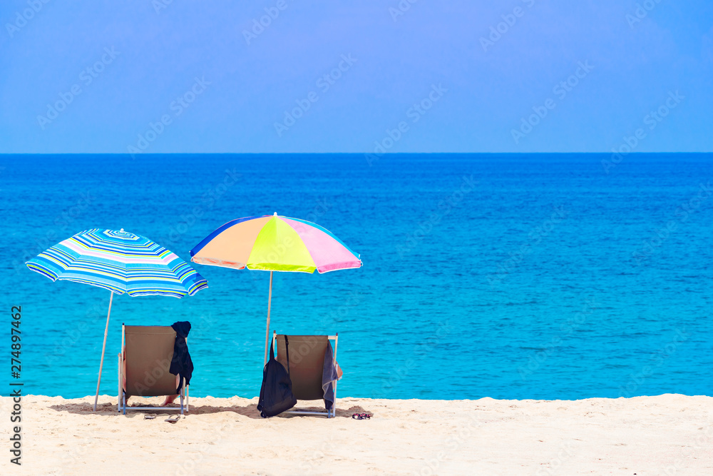  Summer beach landscape  on a relaxing holiday in the middle of an umbrella on a clean white beach and blue sea, Phuket, Thailand