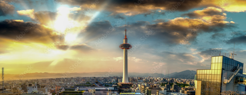 Fototapeta premium Sunset over Kyoto. City tower and skyline