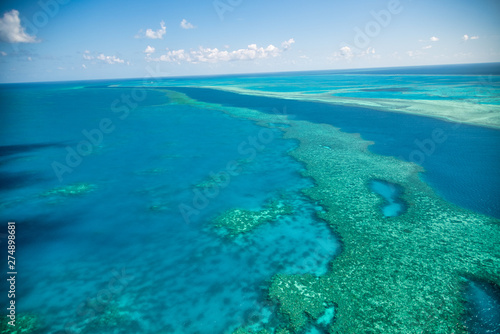 Natural Great Barrier Reef in Queensland. Aerial view of nature paradise with magnificent colors © jovannig