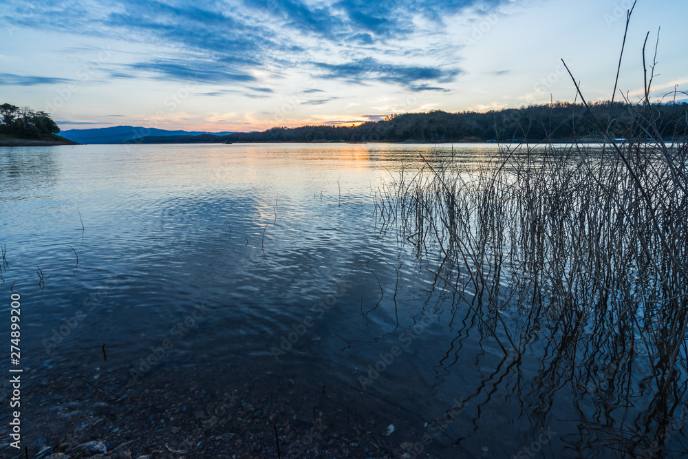 Wide-angle lake in the morning, sunrise after the mountain Wide-angle lake in the morning, sunrise after the mountain