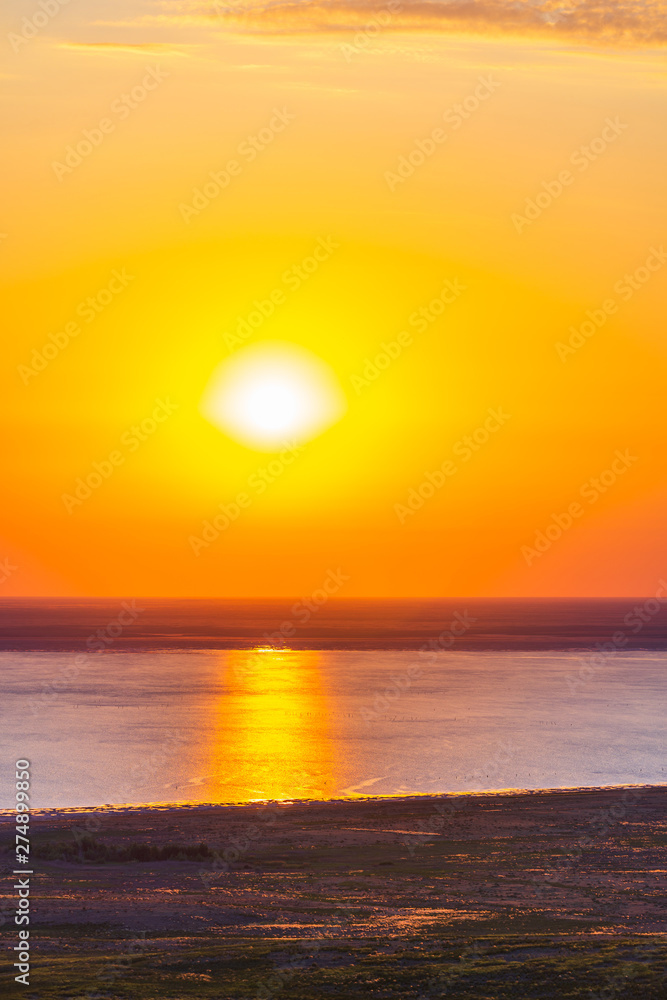 Abstract background with summer lake landscape with golden sunrise. River landscape