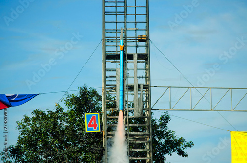 Roi-et,THALAND-JULY 18 : People in country side watch traditional rockets in Rocket festival 'Boon Bang Fai' The celebration for plentiful rains during rice plant season on July 18,2019 Phanomphai.