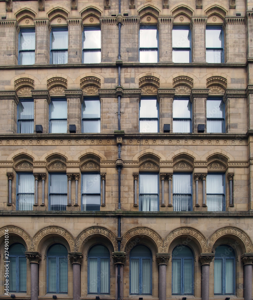 the facade of the former milligan and forbes warehouse in bradford west yorkshire a large palazzo style building built by andrew and delauney in 1853
