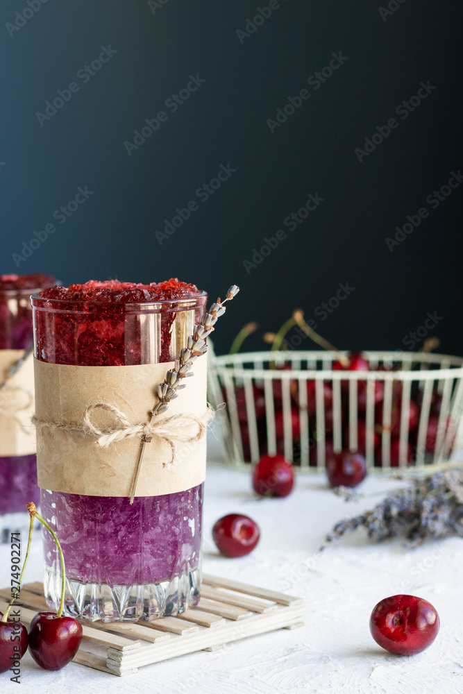 Ice lavender cocktail with cherry syrup