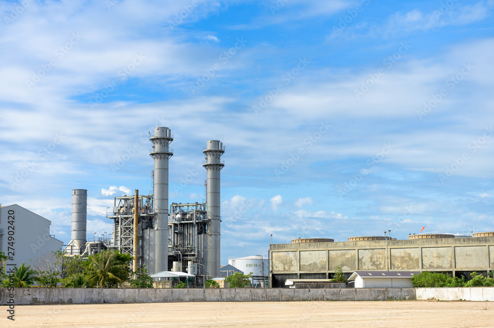 Gas turbine power plant from industry zone with blue sky Gas turbine power plant from industry zone with blue sky