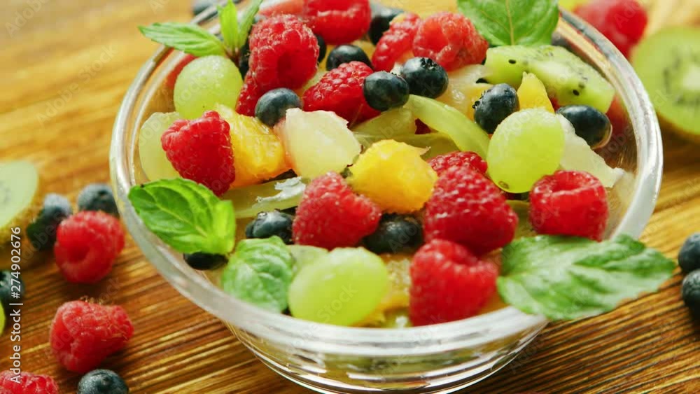 Fruit salad in bowl on table Fruit salad in bowl on table