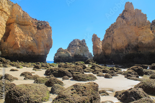 Sand and stones in portuguese beach - Lagos, Algarve Portugal