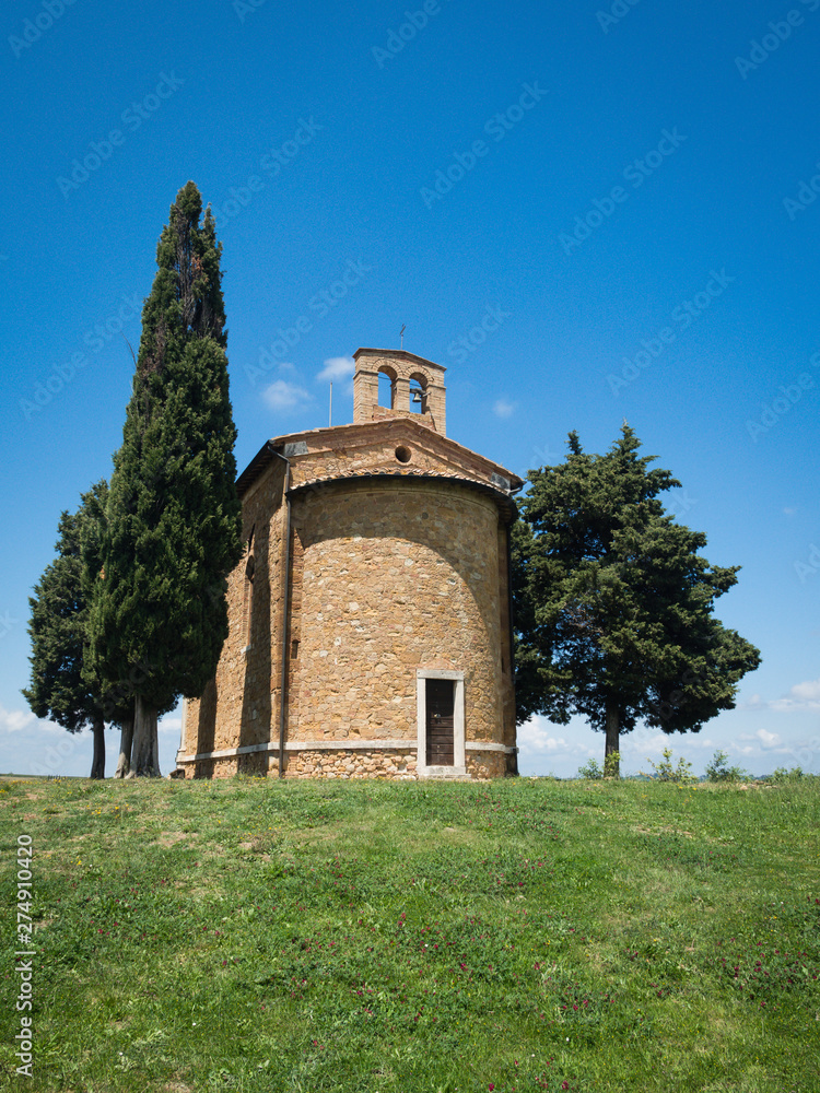 Chapel of Capella di Vitaleta in the Tuscan landscape of the Val d'Orcia Chapel of Capella di Vitaleta in the Tuscan landscape of the Val d'Orcia