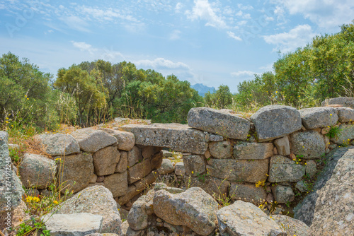 Nuraghe ruins in the landscape of Sardinia in sunlight in spring