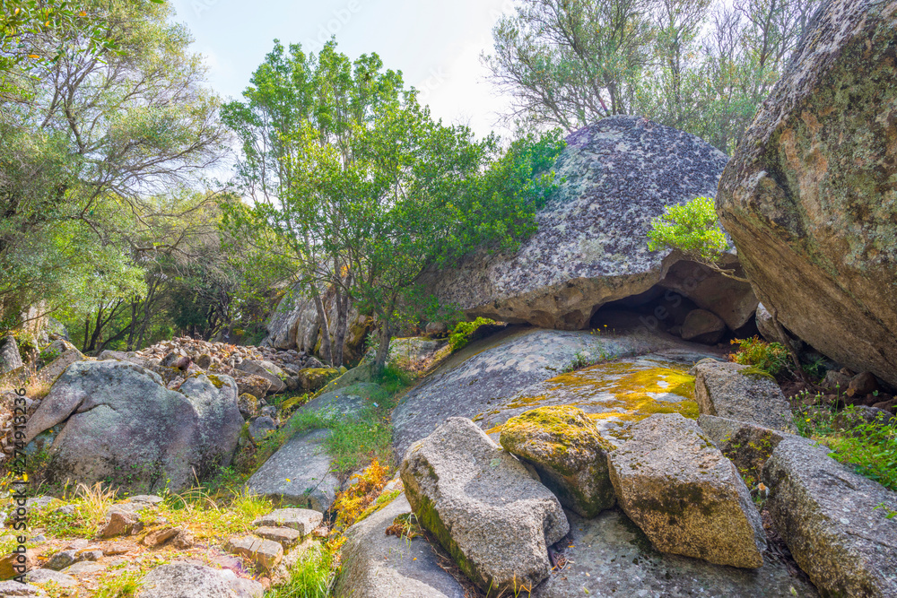 Scenic landscape of green hills and rocky mountains of the island of Sardinia in spring Scenic landscape of green hills and rocky mountains of the island of Sardinia in spring