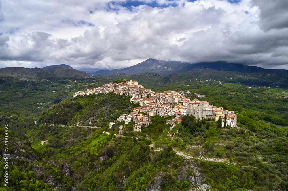 Panoramic view at green hills with old town of Rivello in Italy