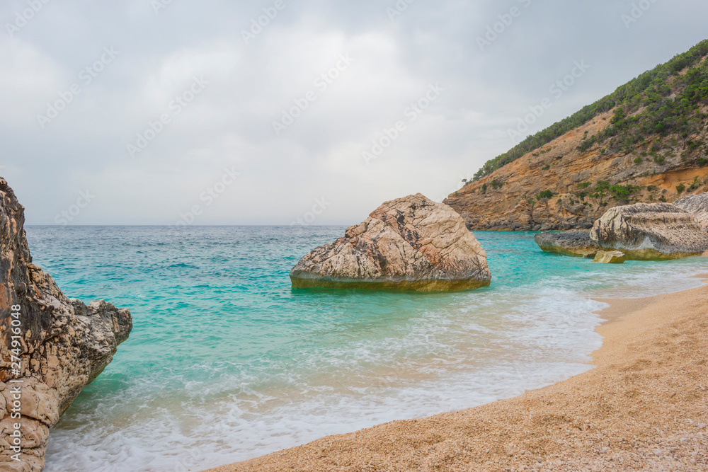 Beaches of the island of Sardinia in the Mediterranean Sea in sunlight in spring Beaches of the island of Sardinia in the Mediterranean Sea in sunlight in spring