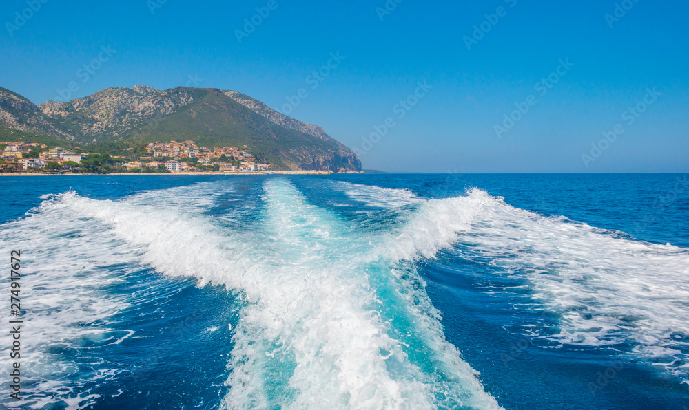 Rocky coast of the island of Sardinia in the Mediterranean Sea viewed from a boat Rocky coast of the island of Sardinia in the Mediterranean Sea viewed from a boat