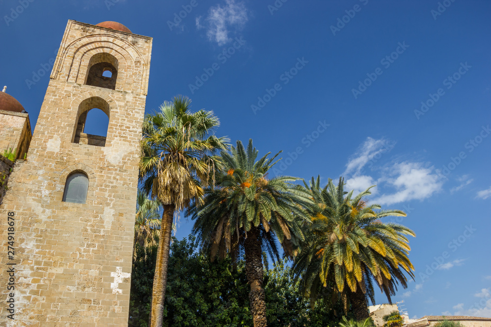 Palermo Sicily famous arabic bell tower of church San Giovanni degli Eremiti, historical heritage with bell tower and palms