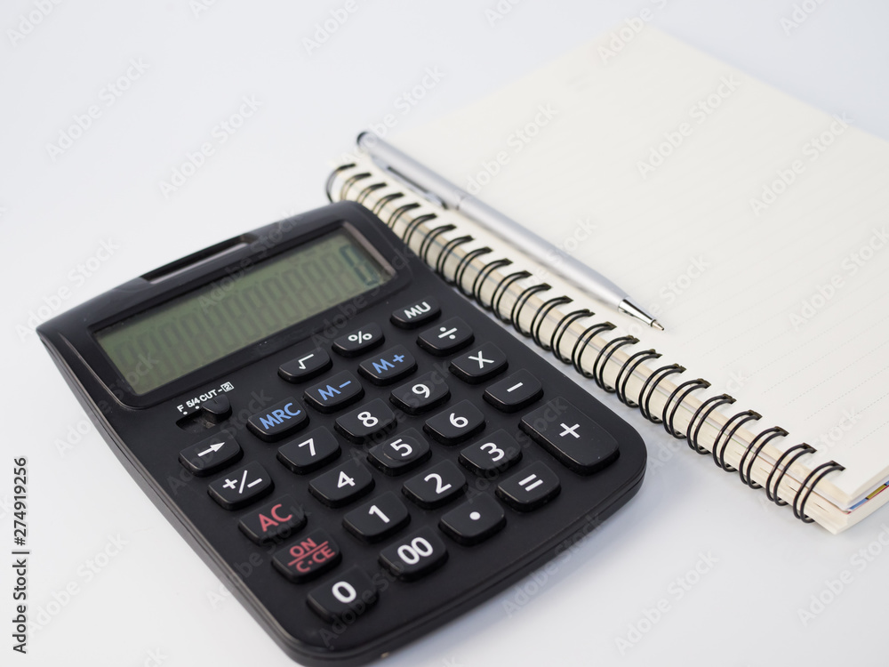 calculator and pen isolated on white background calculator and pen isolated on white background