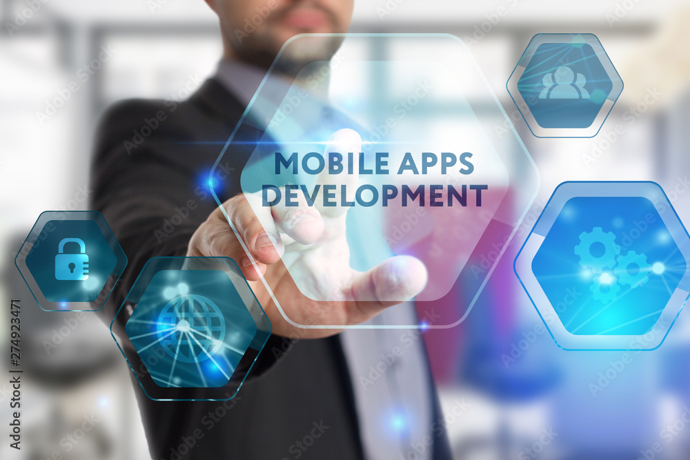 The concept of business, technology, the Internet and the network. A young entrepreneur working on a virtual screen of the future and sees the inscription: Mobile apps development