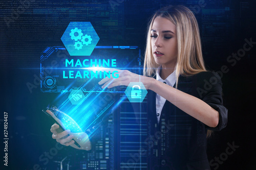 The concept of business, technology, the Internet and the network. A young entrepreneur working on a virtual screen of the future and sees the inscription: Machine learning