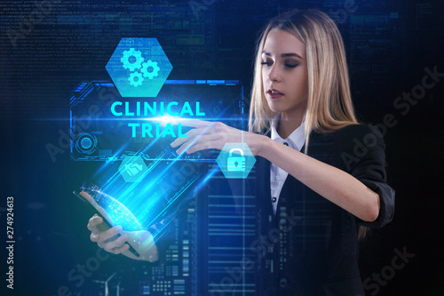 The concept of business, technology, the Internet and the network. A young entrepreneur working on a virtual screen of the future and sees the inscription: Clinical trial