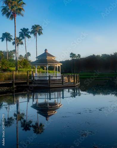 Gazebo provides a restful peaceful place to relax and eperience peace in the morning light .