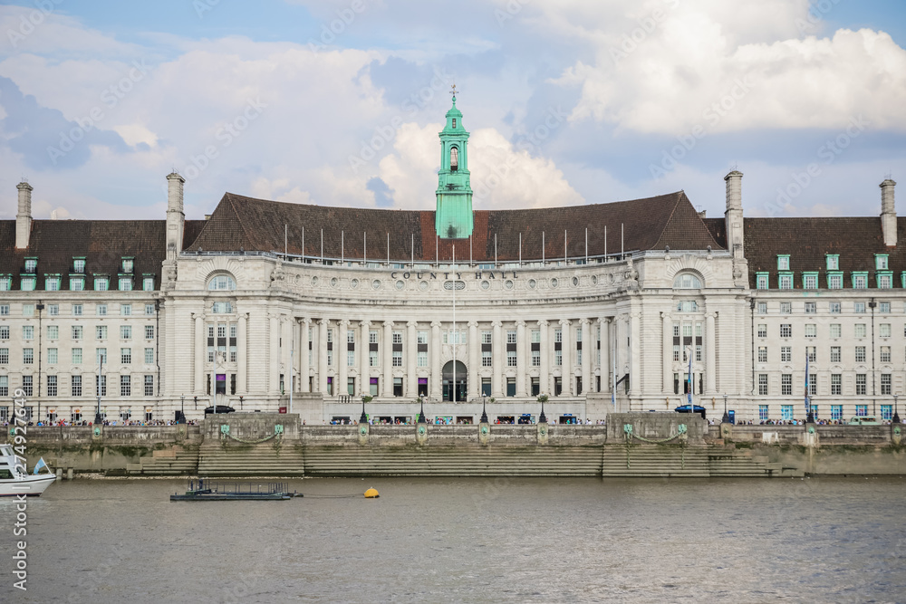 London County Hall seen from the north bank of the River Thames