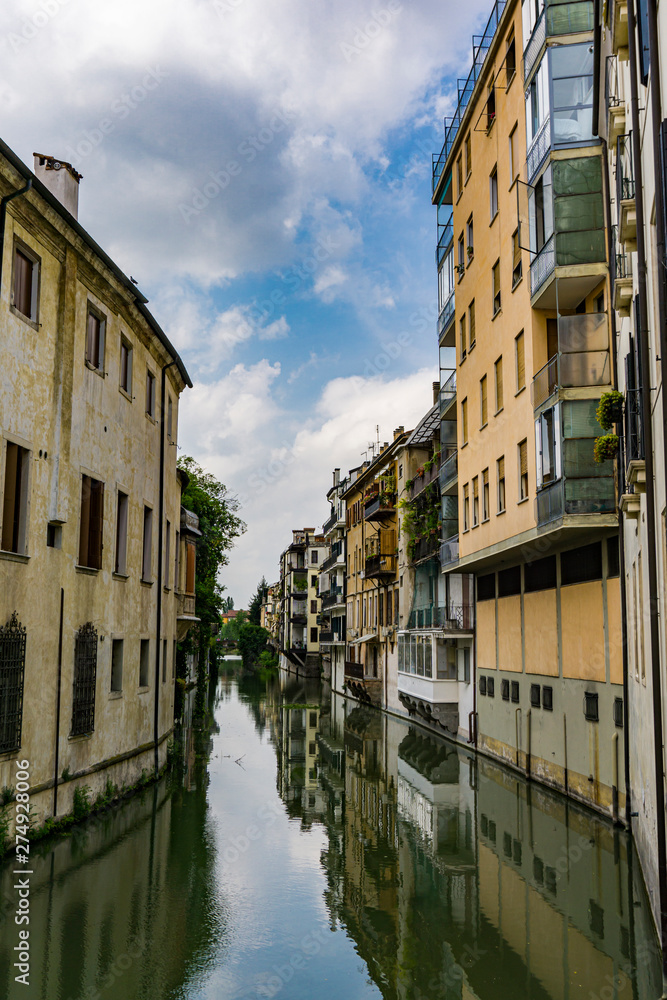 Water channel San Massimo runs among residential houses in the centre of the old city Padua, Italy Water channel San Massimo runs among residential houses in the centre of the old city Padua, Italy