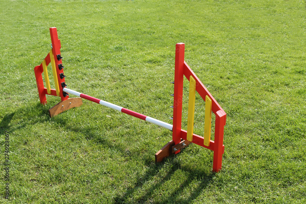 A Wooden Jump Obstacle on a Dog Agility Course. A Wooden Jump Obstacle on a Dog Agility Course.