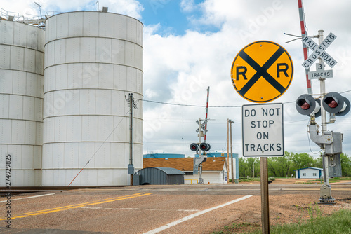 railroad crossing in rural town