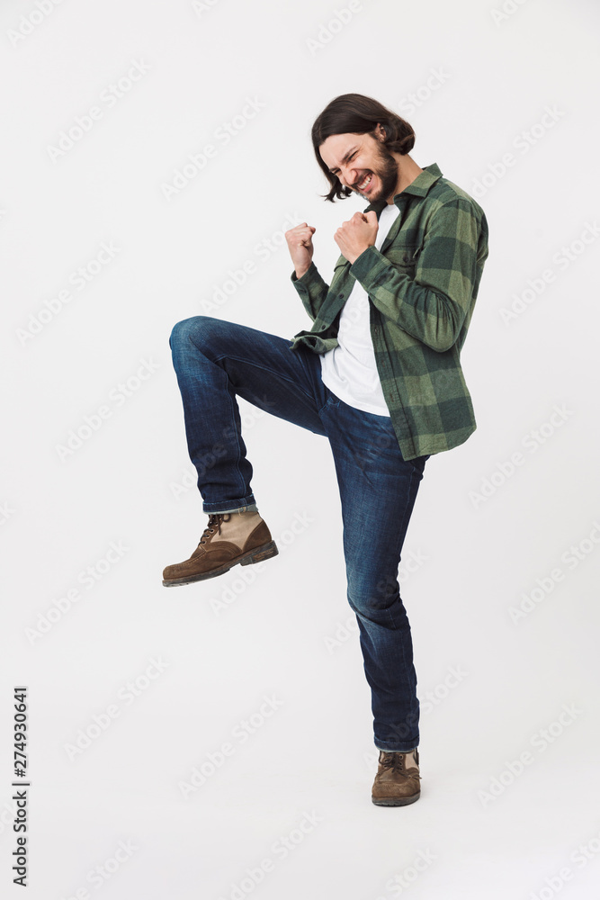 Full length portrait of a young bearded man Full length portrait of a young bearded man