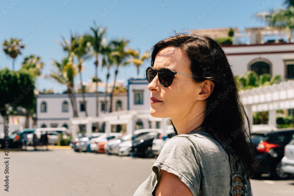 Young woman wearing sunglasses on holidays in Canary Island, Gran Canaria, Spain. Young woman wearing sunglasses on holidays in Canary Island, Gran Canaria, Spain.