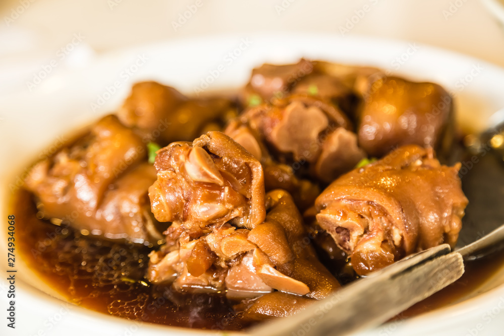 chinese food delicacy Stewed Pig's trotter closeup view chinese food delicacy Stewed Pig's trotter closeup view