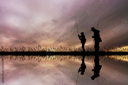child fishing with his dad
