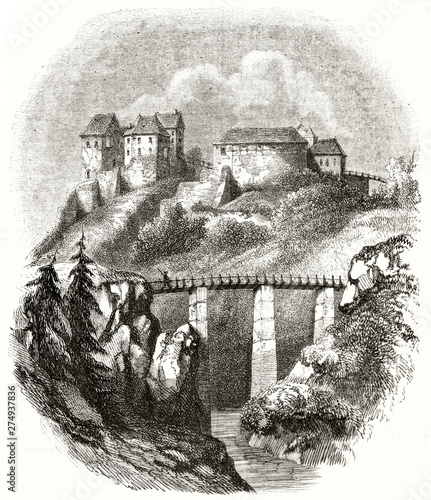 Ancient squared bulky castle on top of a hill surrounded by a natural landscape with a high bridge. Old view of Seeberg Castle Czech Republic. By Quichon publ. on Magasin Pittoresque Paris 1848 photo