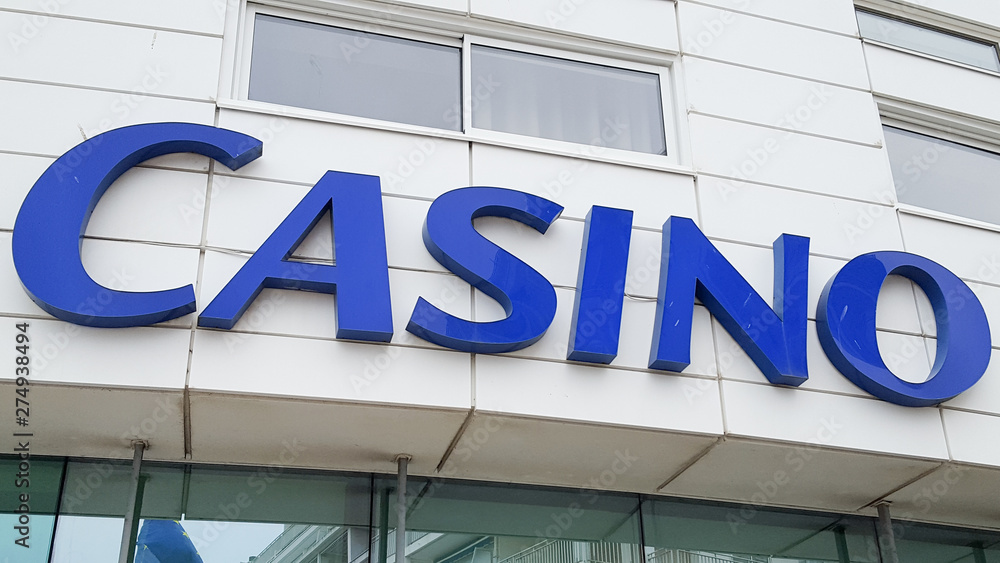 Blue casino sign in wall outdoor Blue casino sign in wall outdoor