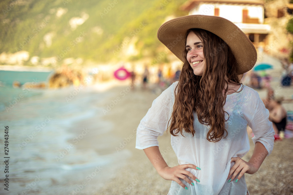 A happy young girl and a Mediterranean sea