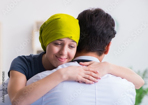 Cancer patient visiting doctor for medical consultation in clini photo