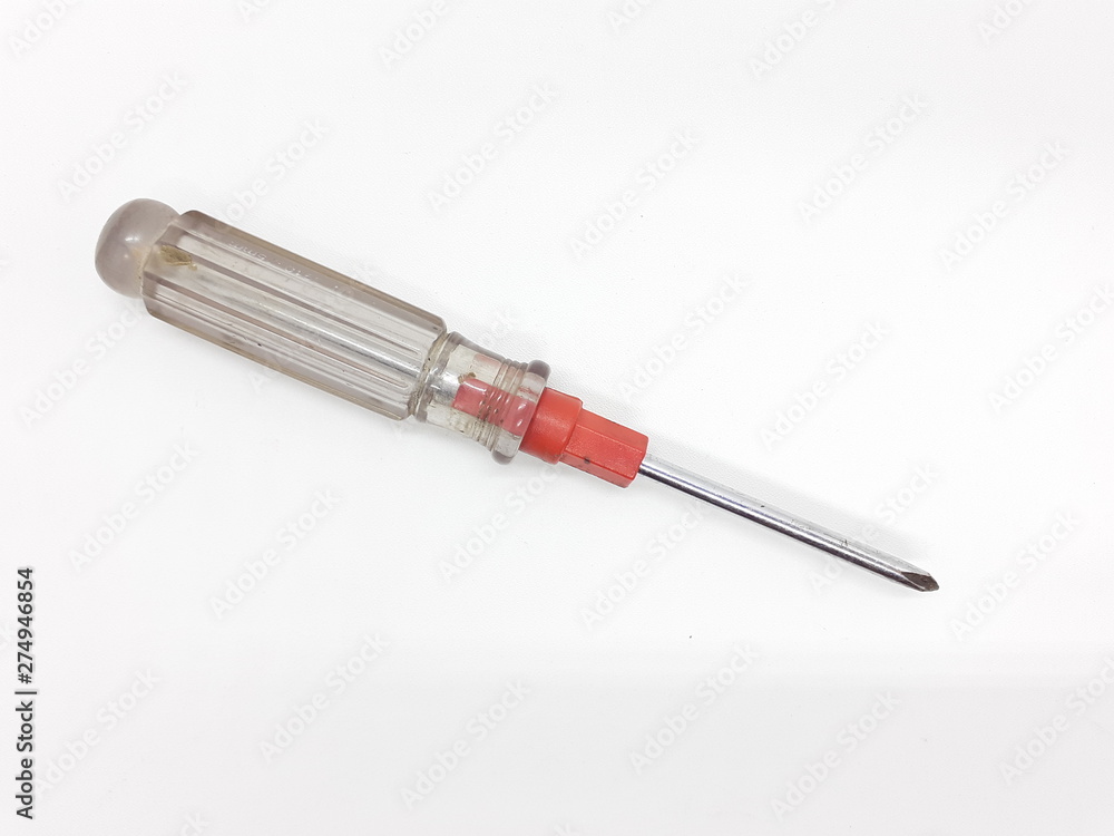 Metallic used rusty screwdriver in White isolated background Metallic used rusty screwdriver in White isolated background