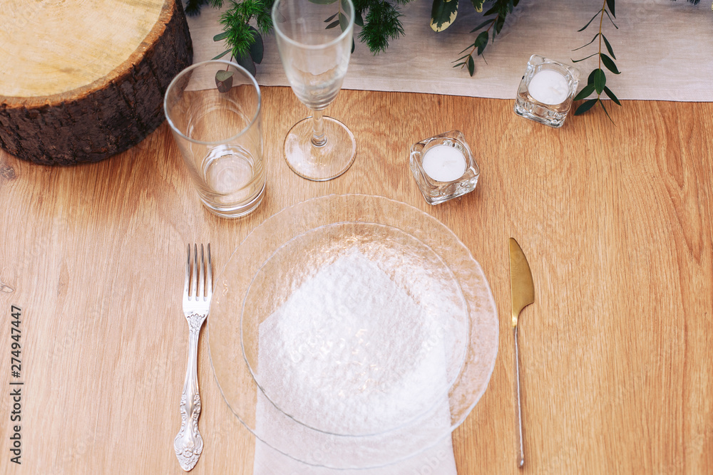 Wedding table setting. Decor made of wood. Wedding table setting. Decor made of wood.