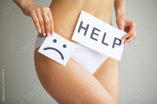 Woman Health. Female Body Holding Symbol Help Card Near Stomach