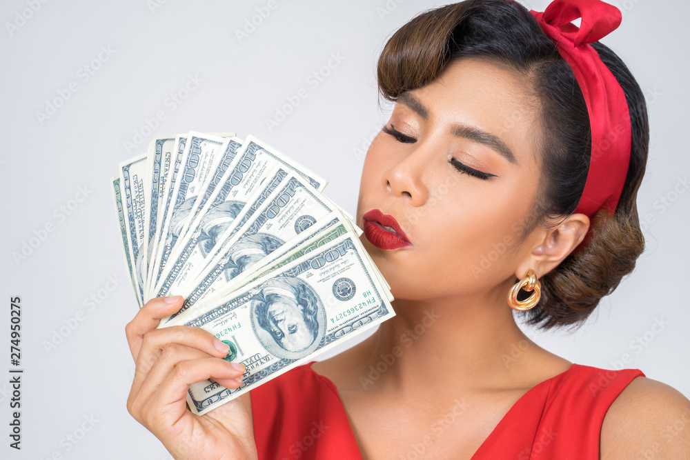 Happy Fashion beautiful woman hand holding dollar money Happy Fashion beautiful woman hand holding dollar money