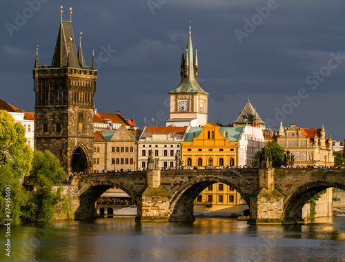 Scenic view on Charles Bridge Vltava river and historical center of Prague. Summer day. Czech Republic. Travel, sightseeing and tourism.