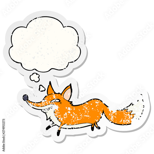 cartoon sly fox and thought bubble as a distressed worn sticker